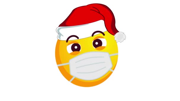 Animation af en sende et kys gul emoji i santa claus julehat og beskyttende medicinsk maske isoleret på hvid baggrund. Alfa kanal. – Stock-video