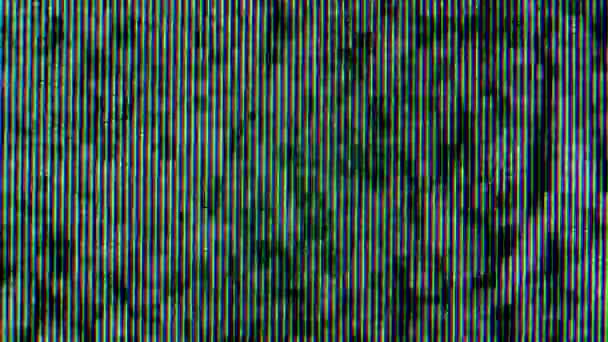 Pixels in het werkende oude analoge tv-scherm close-up. Rode, blauwe en groene stip maken de afbeelding op het scherm. Een Macro. Sluiten.. — Stockvideo