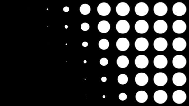 Bezešvé polotónové bílé tečky se objevují a mizí v pohybu na černém pozadí. Animace obrazce ročníku. — Stock video