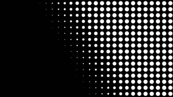 Seamless halftone white dots appear and disappear in motion at black background. Vintage pattern animation. — Stock Video