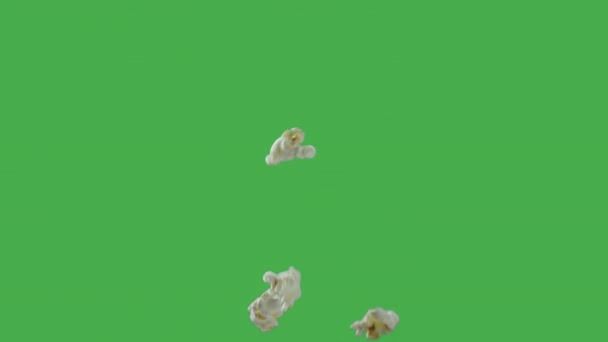 Popping Popcorn Flying and Falling Isolated on ChromaKey Background — Αρχείο Βίντεο