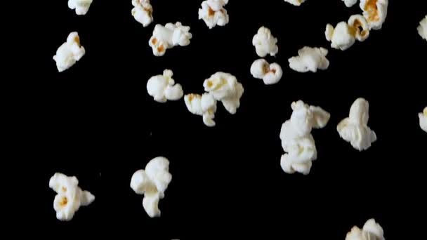 Popcorn Falling Isolated on Black Background — Stok video