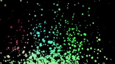 Renkli boya damlaları süper yavaş çekimde düşer. Yüksek hızlı sinema kamerasıyla çekilmiş. Siyah arkaplan.