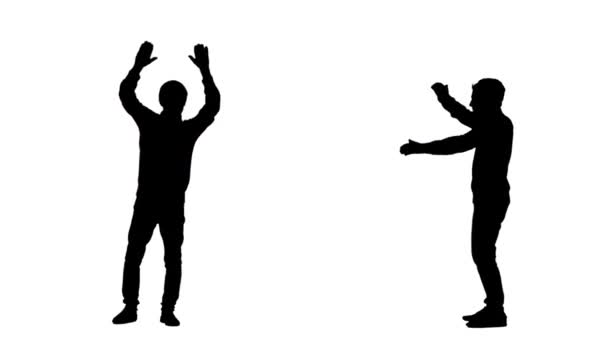 Silhouette noire d'un jeune homme en vêtements de jeunesse élégants dansant une danse moderne dans une discothèque. Collage 2 en 1 Vue de face et de côté sur fond blanc. Ralenti prêt 59.94fps. — Video