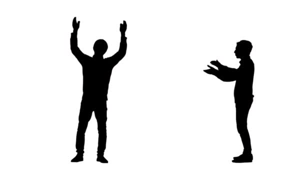 Zwart silhouet van een jonge man in jeugdige stijlvolle kleding danst en klapt in haar handen. 2 in 1 Collage Voor-en zijaanzicht volledige lengte op witte achtergrond. Slow motion klaar 59,94fps. — Stockvideo