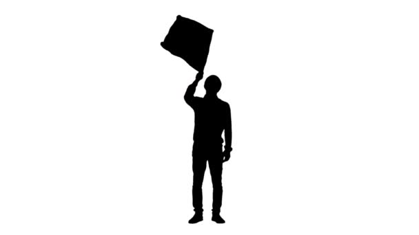 Black silhouette of a young man waving a flag. Full length on white background. Slow motion ready 59.94fps. — Stock Video