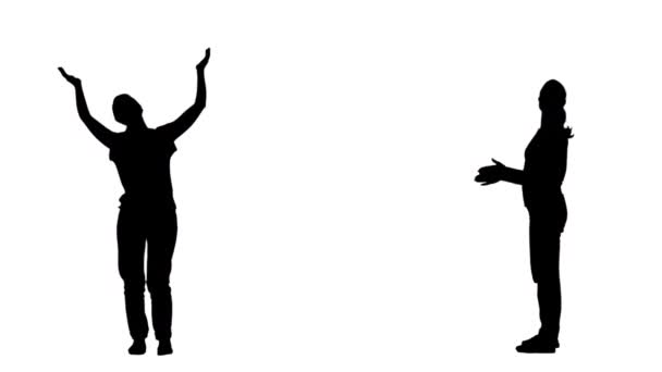 Zwart silhouet van een jonge vrouw in jeugdige stijlvolle kleding danst en klapt in haar handen. 2 in 1 Collage Voor-en zijaanzicht volledige lengte op witte achtergrond. Slow motion klaar 59,94fps. — Stockvideo