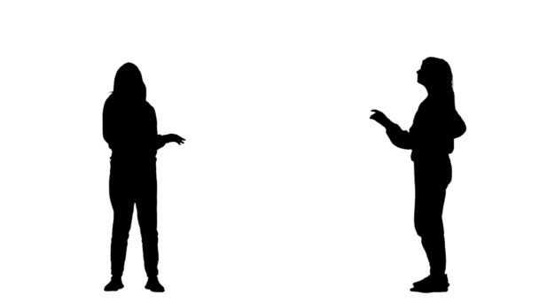 Zwart silhouet van een jonge vrouw in sportkleding die moderne dans danst in een disco. 2 in 1 Collage Voor-en zijaanzicht volledige lengte op witte achtergrond. Slow motion klaar 59,94fps. — Stockvideo