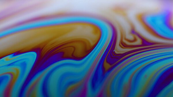The surface of the liquid soap with the changing colors of the rainbow. Light refraction on a soap bubble, vacro close up moving particles. Close up. Slow motion. — Stock Photo, Image
