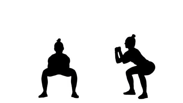 Silhouette noire de jeune femme en tenue de sport faisant des squats. Entraînement pour les fesses, fitness pour les femmes. Collage 2 en 1 Vue de face et de côté sur fond blanc. Ralenti prêt 59.94fps. — Video