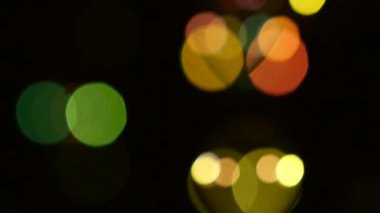 Sarı, yeşil ve turuncu sabun Kabarcıklar siyah, arka plan, bokeh, ağır çekim, yakın