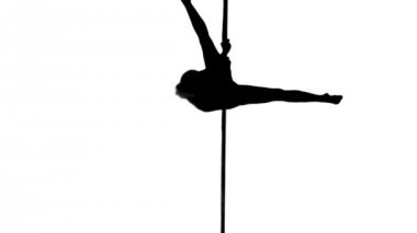 bir beyaz kadın kutup dansçı beyaz zemin üzerine izole siluet Studio