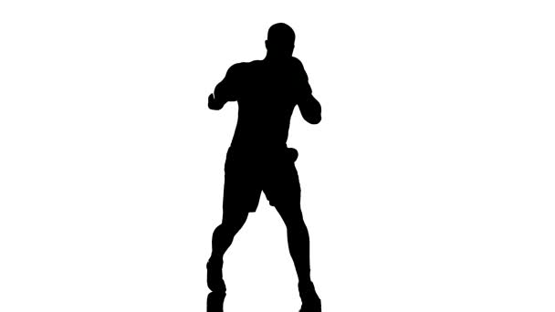 ein kaukasischer Mann übt Boxen Boxer Workout Fitness in Silhouette Studio isoliert auf weißem Hintergrund