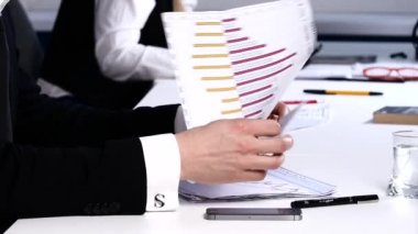 Workflow office: the girl looks like a colleague psyche. Slow motion