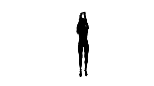 Dancing gogo girl silhouette on a white background. Slow motion. — Stock Video