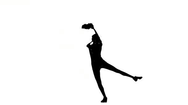 Young cheerleader with pom-poms smiling at camera, acrobatic wheel, Silhoutte — 图库视频影像