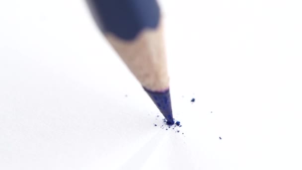 Broken head of sharp blue pencil on a white, slow motion — Stock Video