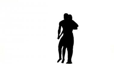 İki latino dansçı eylem, siluet, beyaz
