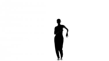 Young social latina dancer continue dancing, barefoot, on white, silhouette