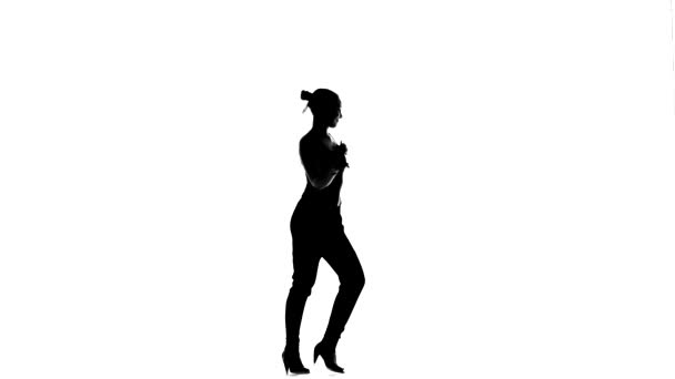 Young social latina dancer continue dancing, on white, silhouette — ストック動画