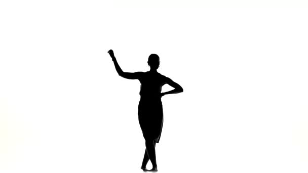 Beautiful dancer woman go on dancing social latino dance barefoot, on white, silhouette — Stock Video