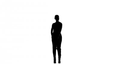 Young social latin dancer girl starting moving dancing, on white, slow motion, silhouette