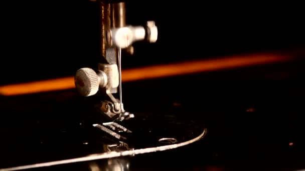 Working sewing machine isolated on black background — 图库视频影像