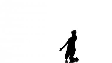 Siluetleri jimnastikçi çalış bir topu, güzel hüner, siyah ve beyaz resim, yavaş hareket ile