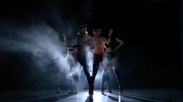 Night club striptease dancer. Strong men and woman. Slow motion, smoke — Stock Video
