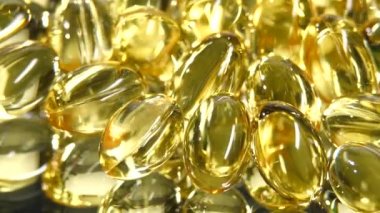 Omega 3 balık yağı kapsülleri, rotasyon, yansıma, yakın
