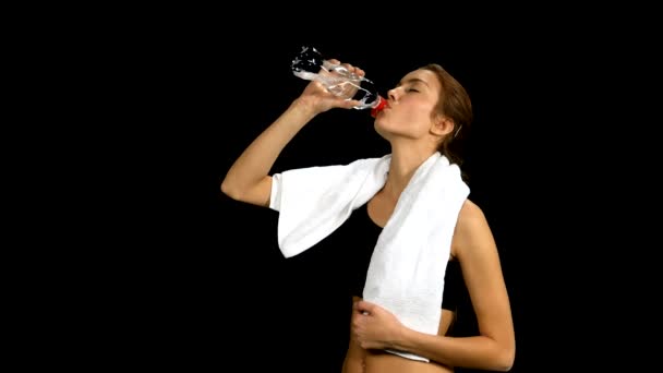 Sporty muscular woman drinking water, close up, alpha channel, matte — Stock Video