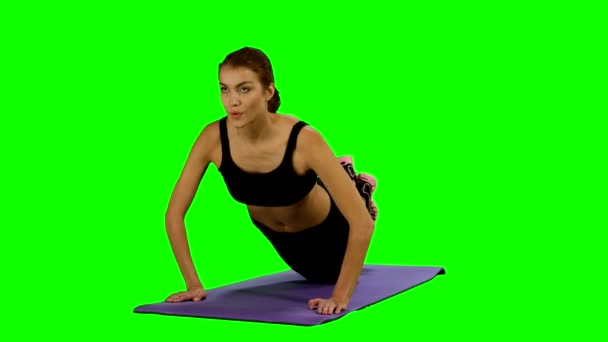 Woman in a traditional yoga pose, Green screen, stretching. Gym — Stock Footage Woman in a traditional yoga pose, Green screen, stretching. Gym Royalty Free Stock Video