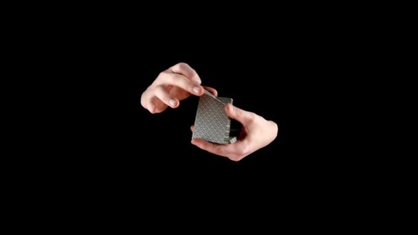 Trick of magician with cards - changing the card, on black, slow motion — Stock Video