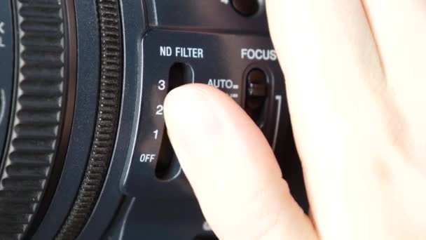 Finger wechselt Videoschalter an Digitalkamera, nd-Filter — Stockvideo