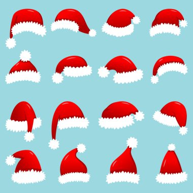 Beyaz arkaplanda izole edilmiş kırmızı Noel Baba şapkaları.