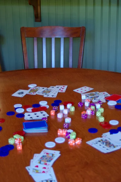 Table Full Cards Poker Chips Dice Wooden Chair — Stock Photo, Image