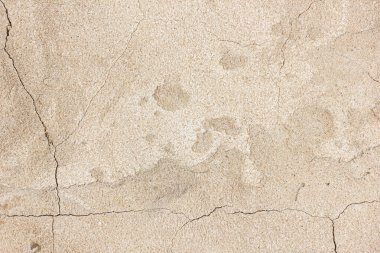 Duvar arkası. Taş bej kumaş. Pis duvar kâğıdı.