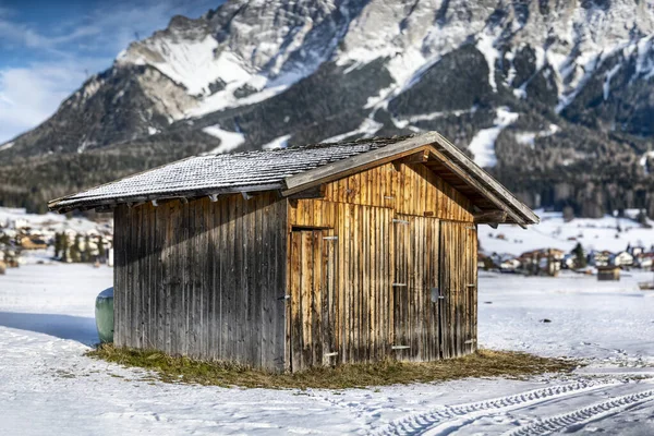 Old Equipment Barn Sunburned Wood Snow Covered Field Front Zugspitze — Stock Photo, Image