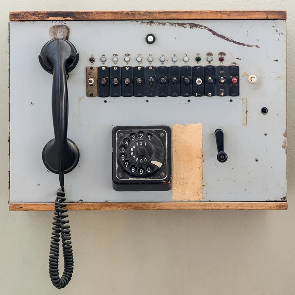 Old analog telephone cell with jog dial in wooden box — Stock Photo, Image