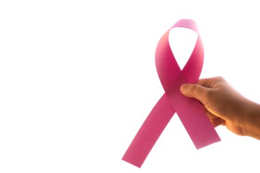Vagon 'un elinde duran pembe kağıt kurdele, Wagman' ın göğüs kanseriyle savaşmak için kullanılan konsept, dünyanın dört bir yanındaki konservelerden hasta olan, yumuşak ve seçici odaklı.