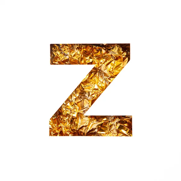 Goldbuchstabe Z des englischen Alphabets aus glänzender Folie und Papier, isoliert auf Weiß geschnitten. Festliche goldene Schrift — Stockfoto
