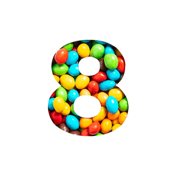 Αριθμός οκτώ πολύχρωμες καραμέλες και χαρτί κομμένο σε σχήμα όγδοου αριθμού απομονωμένο σε λευκό. Εορταστική νόστιμη γραμματοσειρά — Φωτογραφία Αρχείου