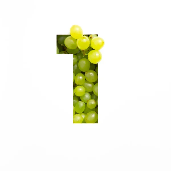 Nummer eins der grünen Trauben und Papier geschnitten in Form der ersten Ziffer isoliert auf weiß. Natürliche Schrift aus frischen Beeren — Stockfoto