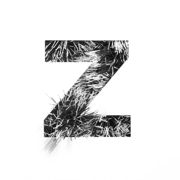 Svart bokstav Z i engelskt alfabet av monokrom tinsel och papper skuren isolerad på vit.Typsnitt för design — Stockfoto