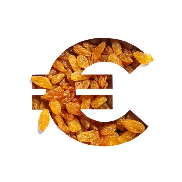 Euros Geldzeichen aus Rosinen und geschnittenem Papier isoliert auf weiß. Quelle der getrockneten Trauben — Stockfoto
