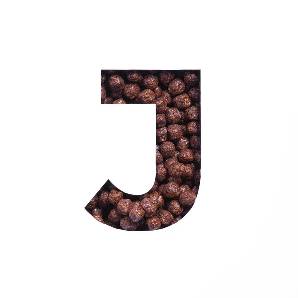 Buchstabe J des englischen Alphabets der nahrhaften Schokolade Getreidekugeln, weiß geschnittenes Papier. Schrift für Bioladen — Stockfoto