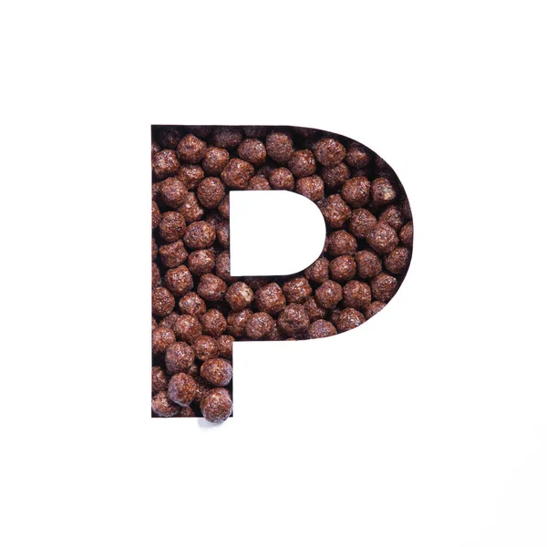 Buchstabe P des Alphabets der nahrhaften Schokolade Müslibällchen, weiß geschnittenes Papier. Schrift für gesunde Frühstücksverpackungen — Stockfoto
