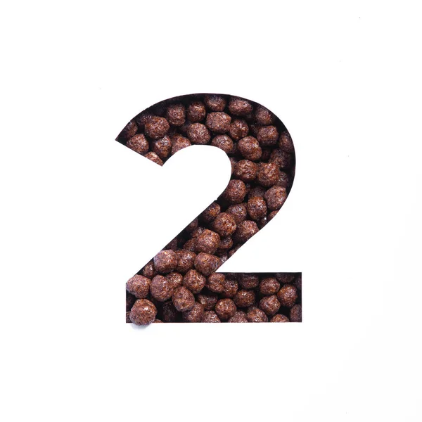 Nummer twee van voedings chocolade cornflakes ballen, wit gesneden papier. Tweede cijfer. Typeface voor gezonde producten winkel — Stockfoto
