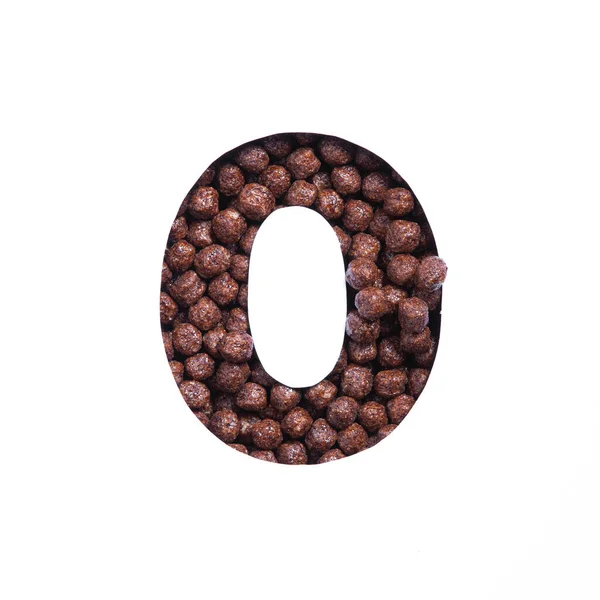 Zahl Null der Schokoladen-Müslibällchen, weißes Papier in Form einer Nullziffer. Schrift für den Laden gesunder Produkte — Stockfoto