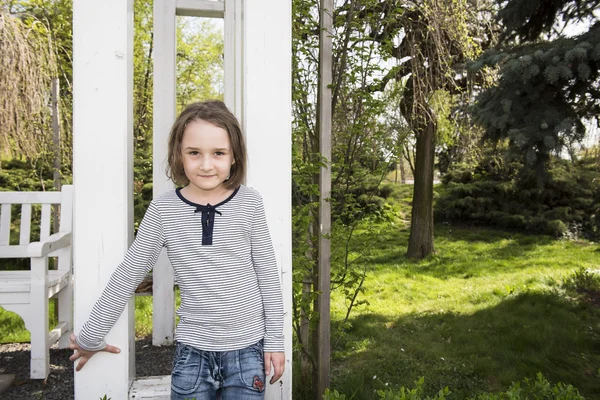 Little cute blonde girl enjoying a beautiful day outdoor — Stock Photo, Image